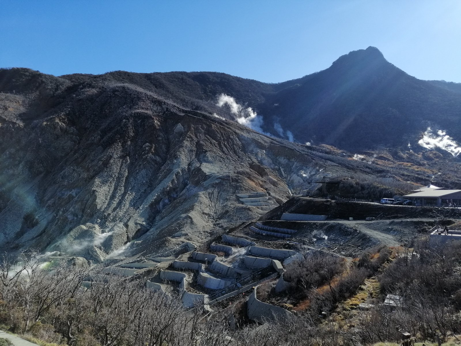 A volcano with smoke rising